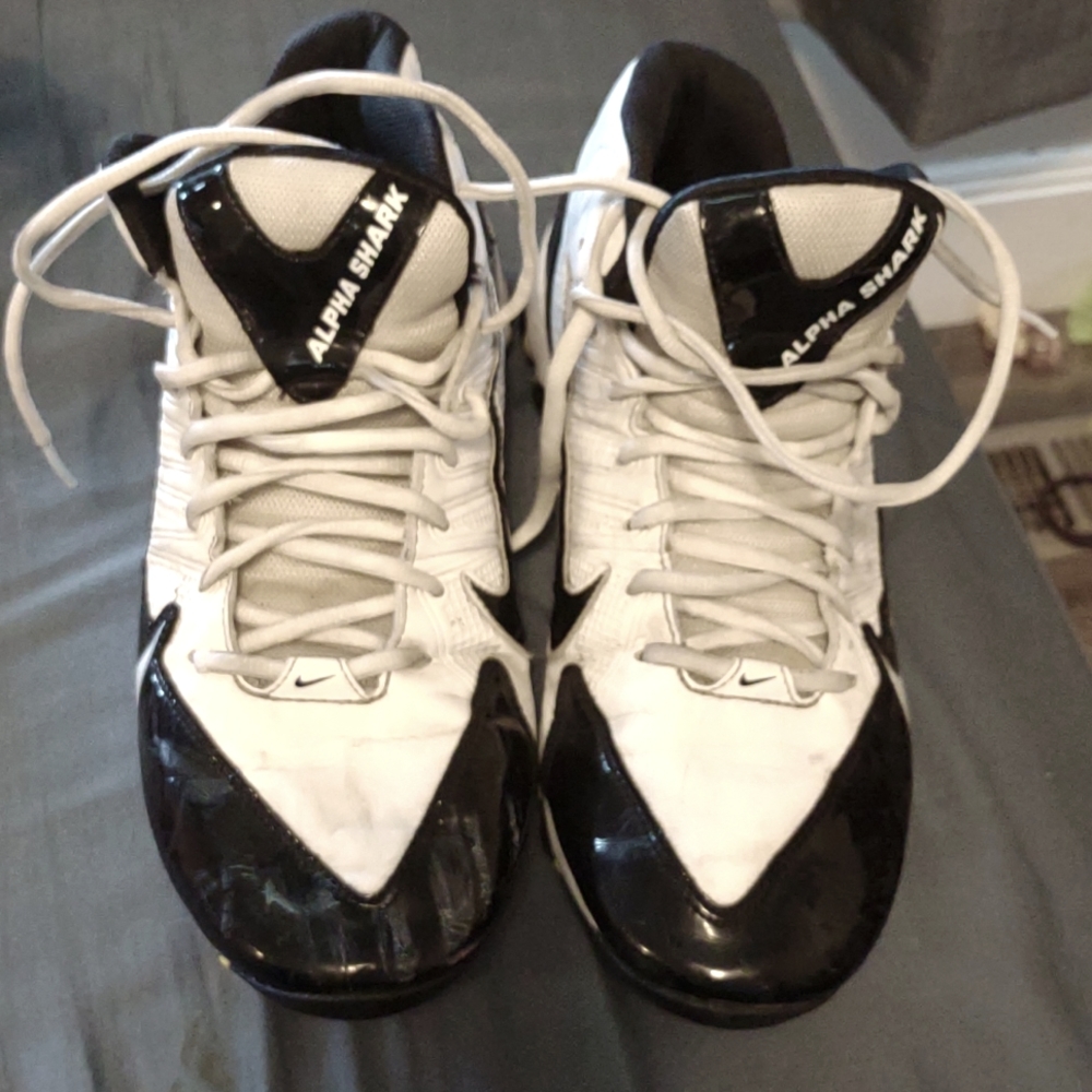 Men's size 11 Nike Alpha shark football cleats, White with black trim, midtop